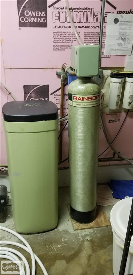 13124 Burgess Road Memphis, MI 48041 - Photo 34 of 55 Water Softener Owned and included in the sale of the home.