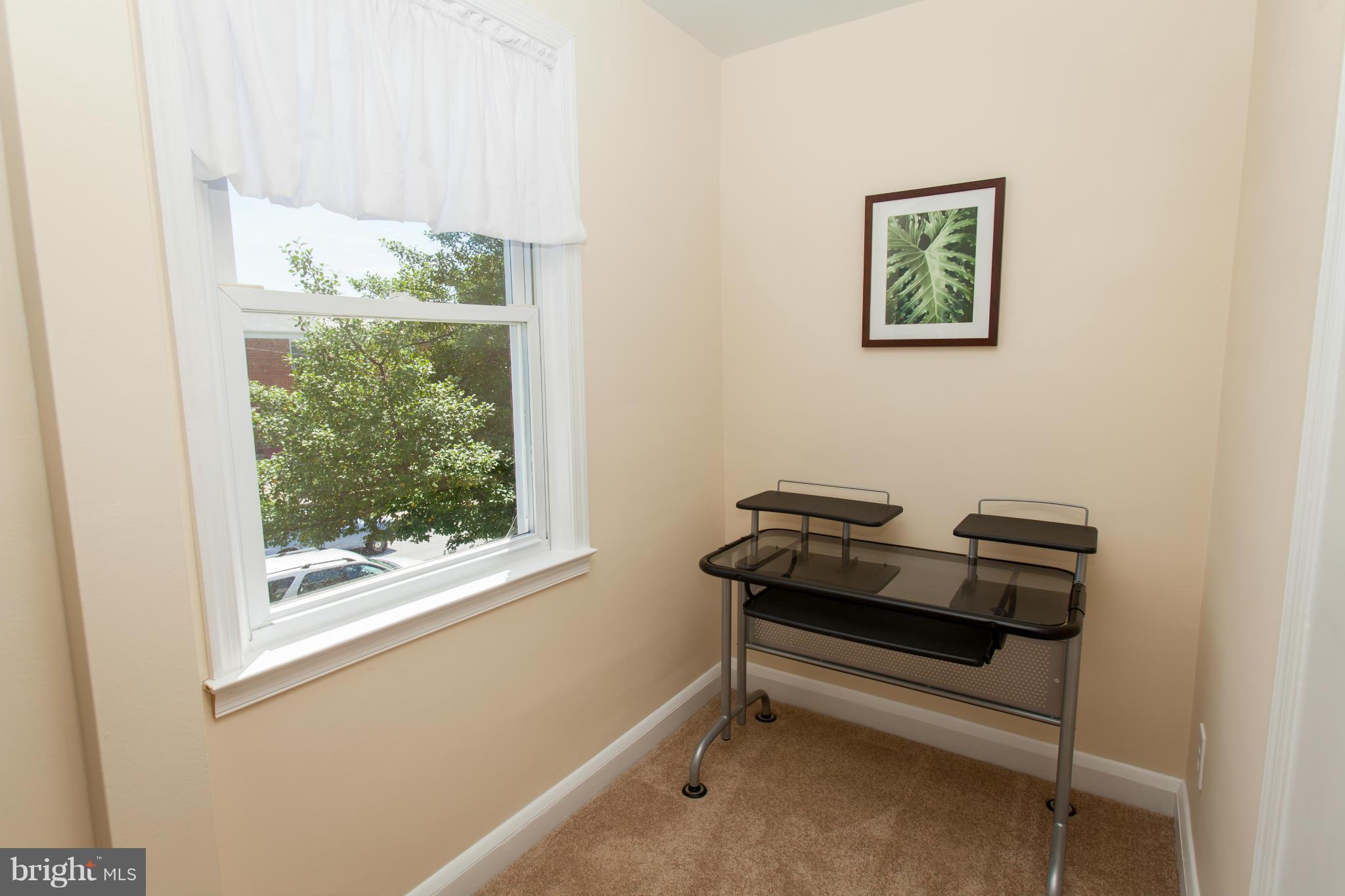 2962 Cornwall Road Dundalk, MD 21222 - Photo 18 of 28 a view of a room with furniture and a window