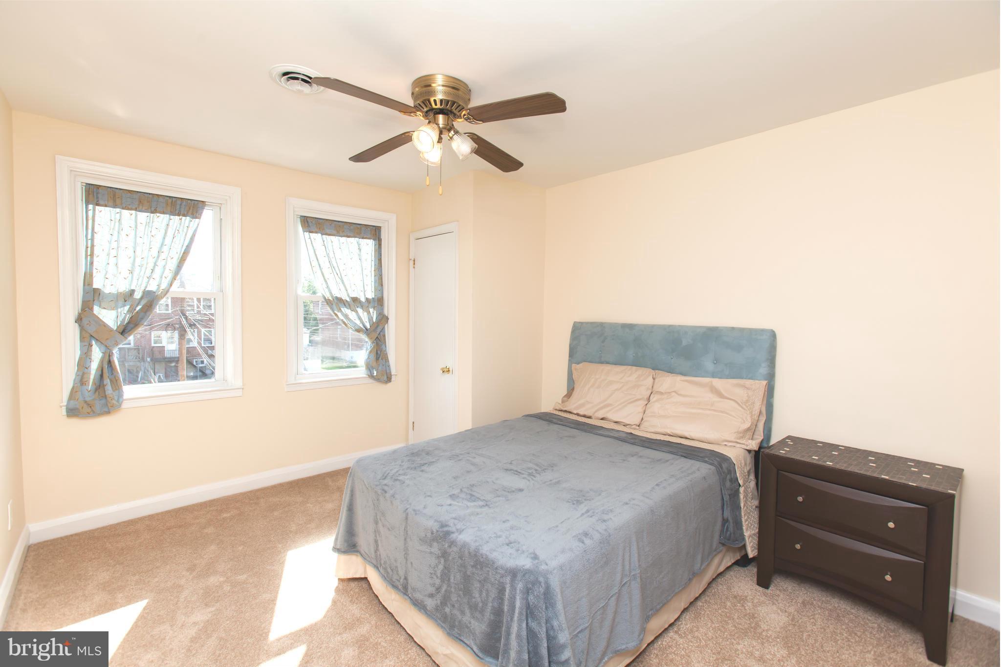2962 Cornwall Road Dundalk, MD 21222 - Photo 21 of 28 a bedroom with a bed and window