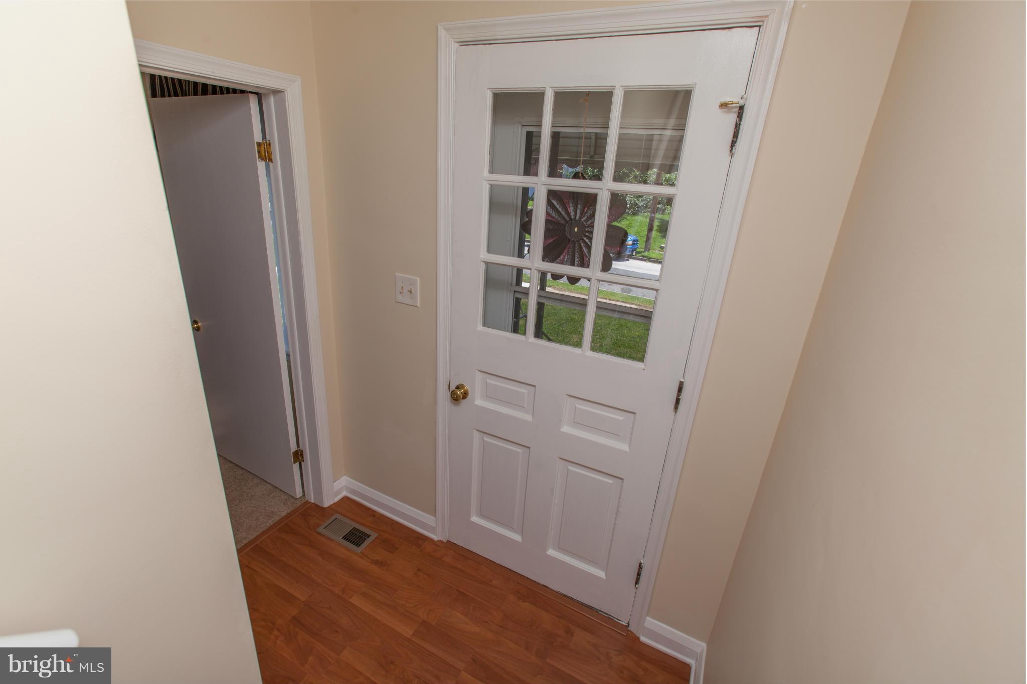 2962 Cornwall Road Dundalk, MD 21222 - Photo 23 of 28 an empty room with windows