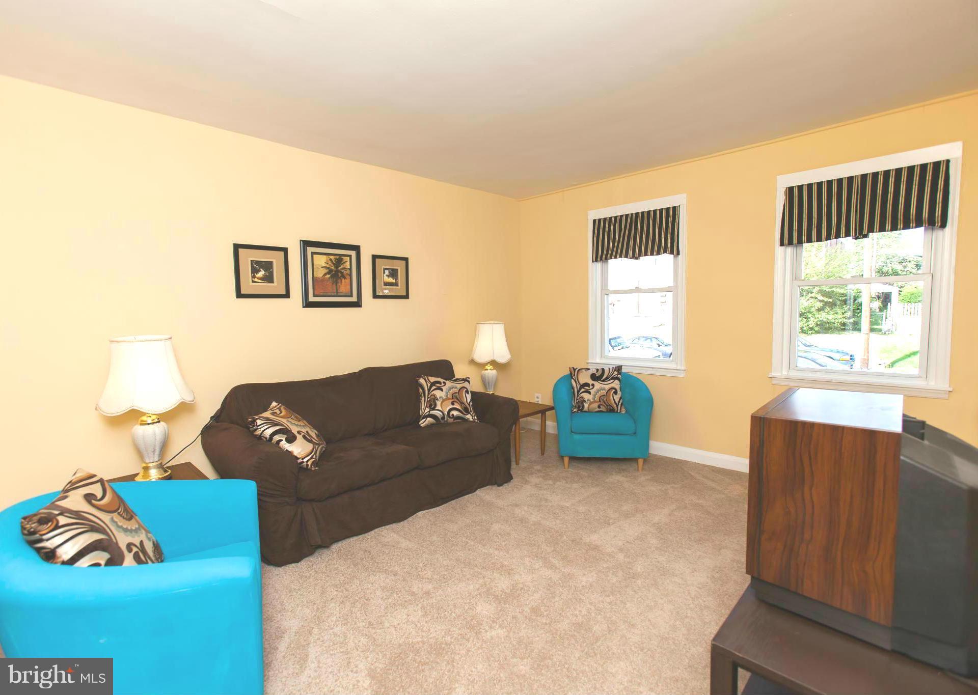 2962 Cornwall Road Dundalk, MD 21222 - Photo 5 of 28 a living room with furniture and a window