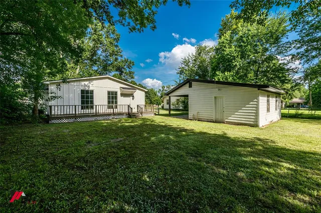 a house view with a garden space