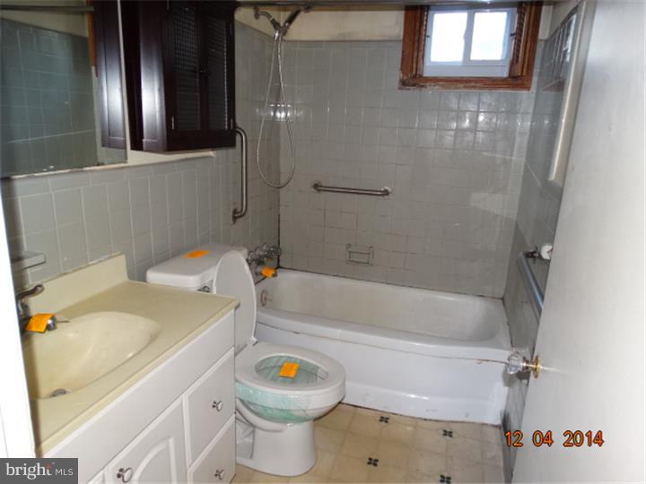 12 Devonwood Road Wayne, PA 19087 - Photo 12 of 16 a bathroom with a sink and a bathtub