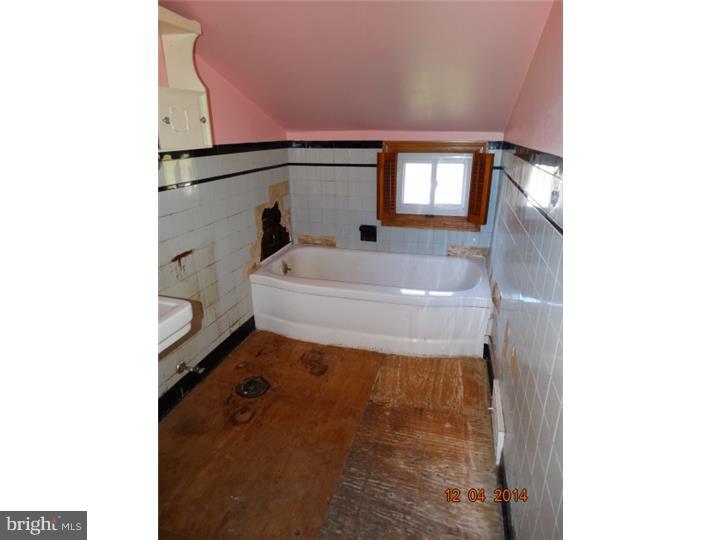 12 Devonwood Road Wayne, PA 19087 - Photo 14 of 16 a en suite bathroom with a sink and mirror