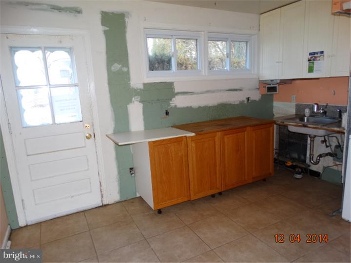 12 Devonwood Road Wayne, PA 19087 - Photo 6 of 16 wooden floor and window in a room