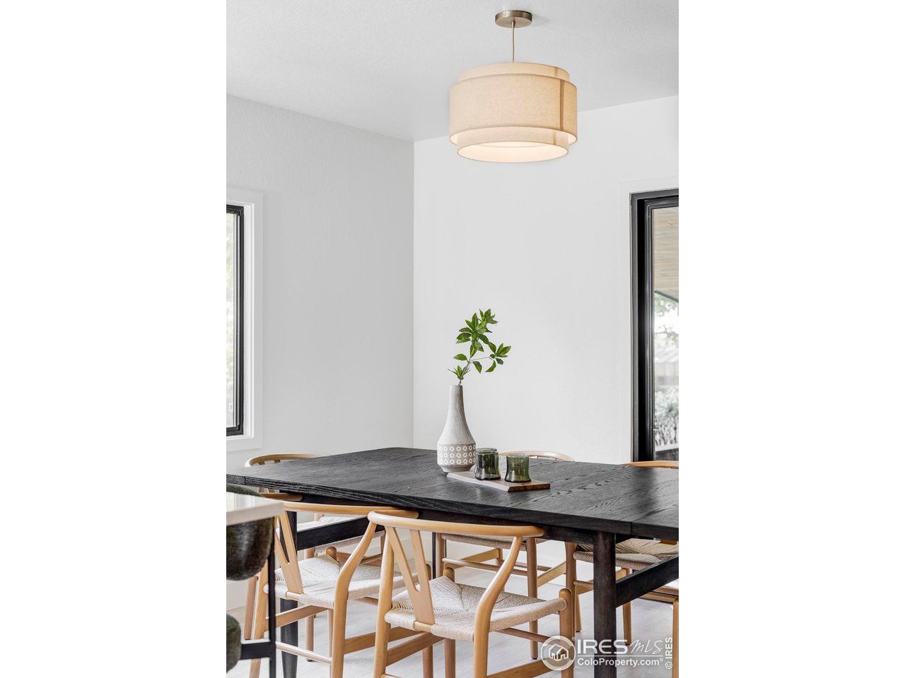 1112 Robertson Street Fort Collins, CO 80524 - Photo 17 of 40 a vase of flowers sitting on a table