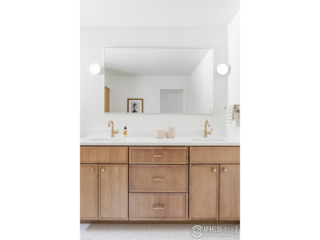 1112 Robertson Street Fort Collins, CO 80524 - Photo 24 of 40 a bathroom with a sink and a mirror