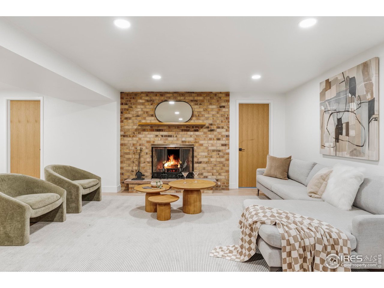 1112 Robertson Street Fort Collins, CO 80524 - Photo 28 of 40 a living room with furniture and a fireplace