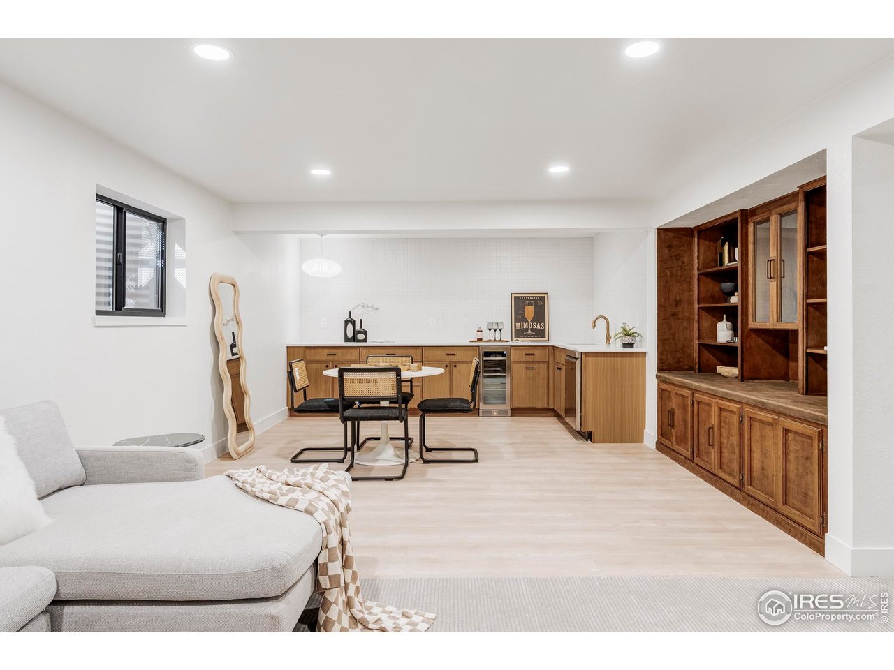 1112 Robertson Street Fort Collins, CO 80524 - Photo 30 of 40 a living room with furniture and a large window