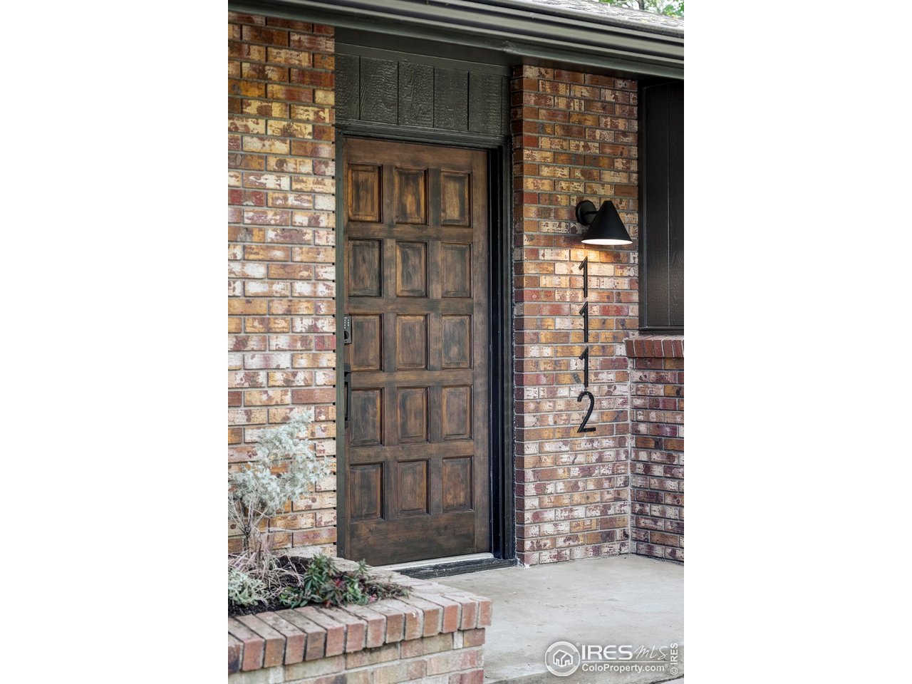 1112 Robertson Street Fort Collins, CO 80524 - Photo 3 of 40 a front view of a house