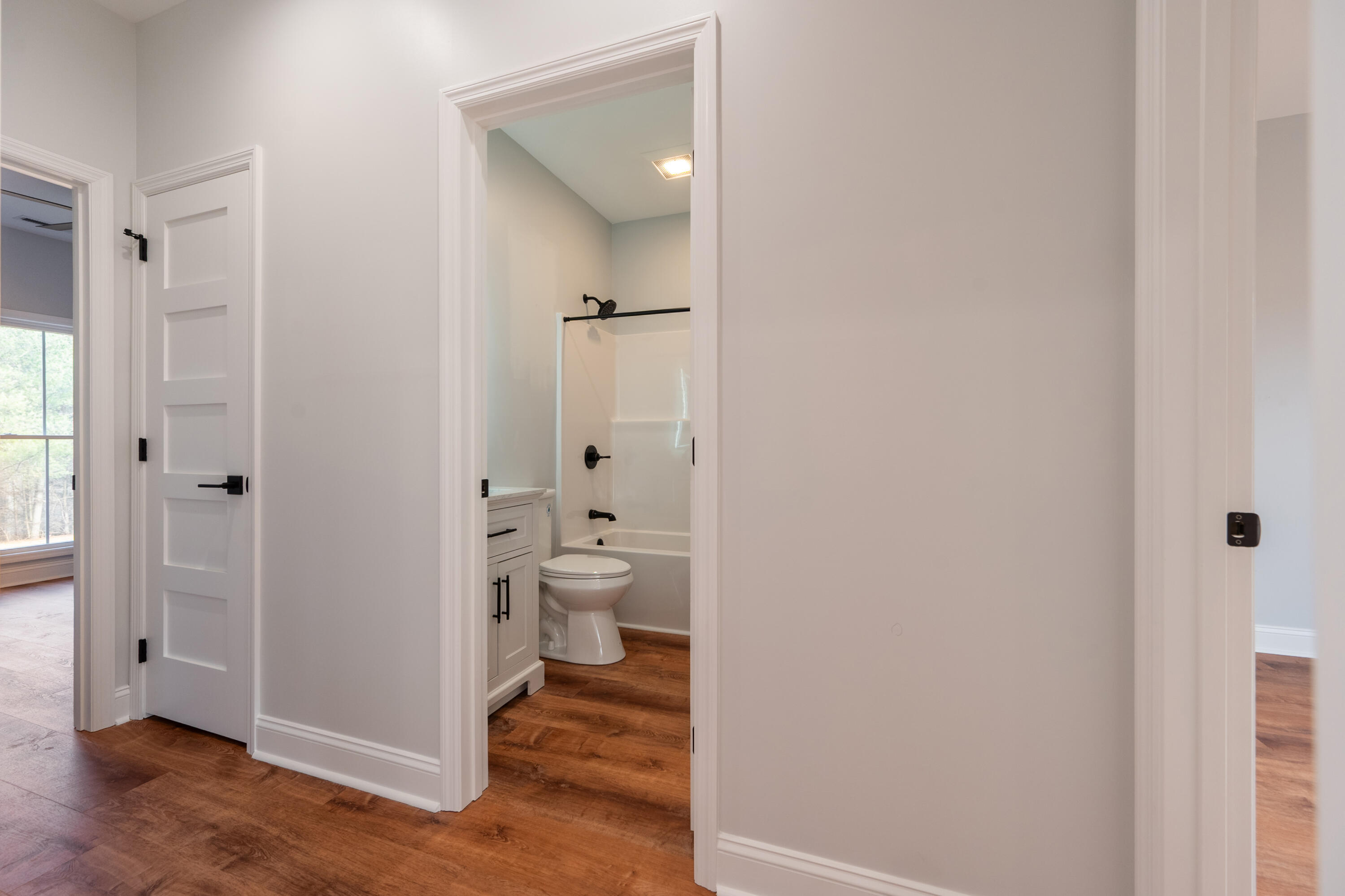 1047 Barberry Road Southeast Floyd, VA 24091 - Photo 30 of 50 a bathroom with a granite countertop toilet and a shower