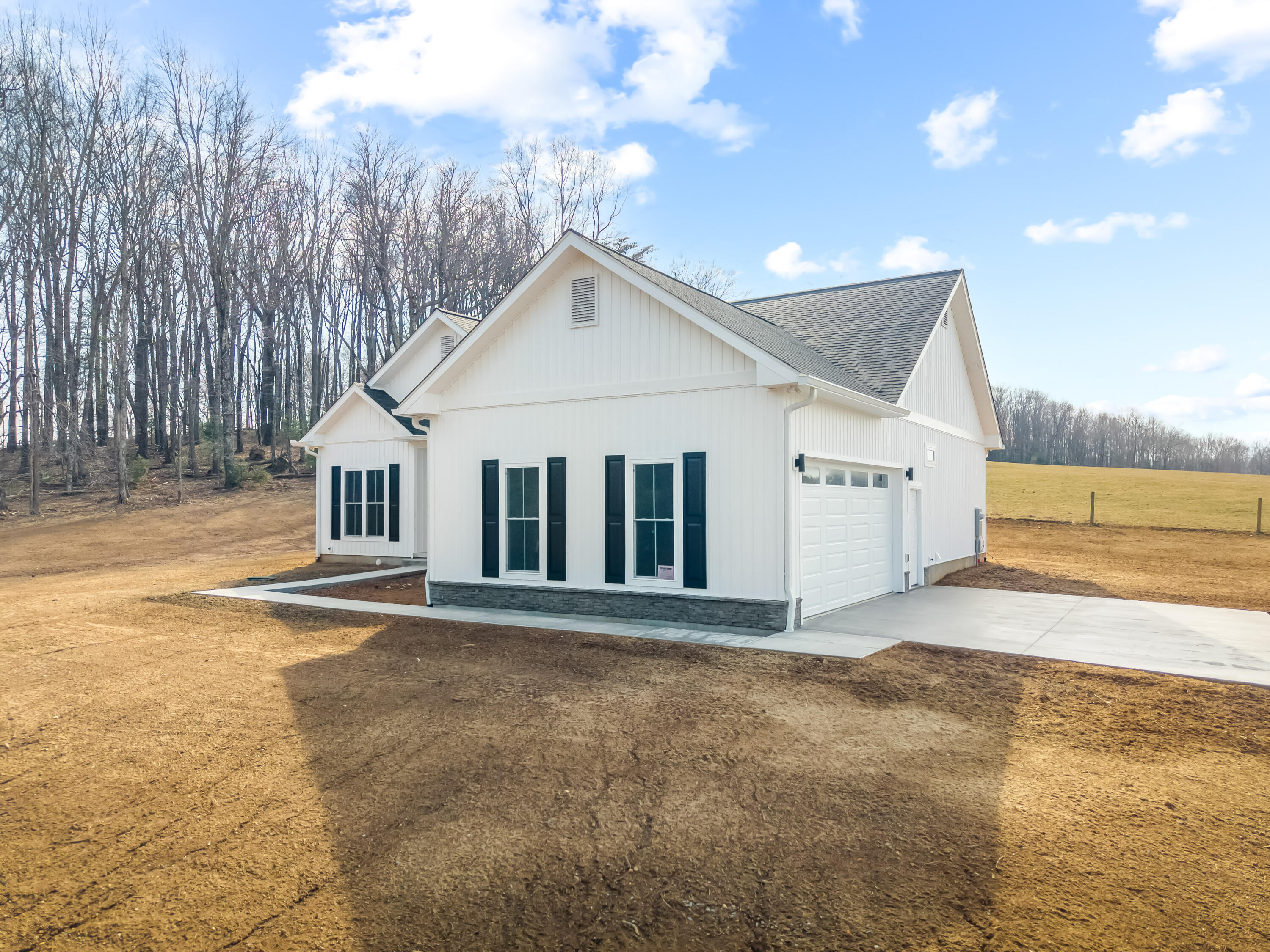 1047 Barberry Road Southeast Floyd, VA 24091 - Photo 41 of 50 a view of a house with a yard and fence