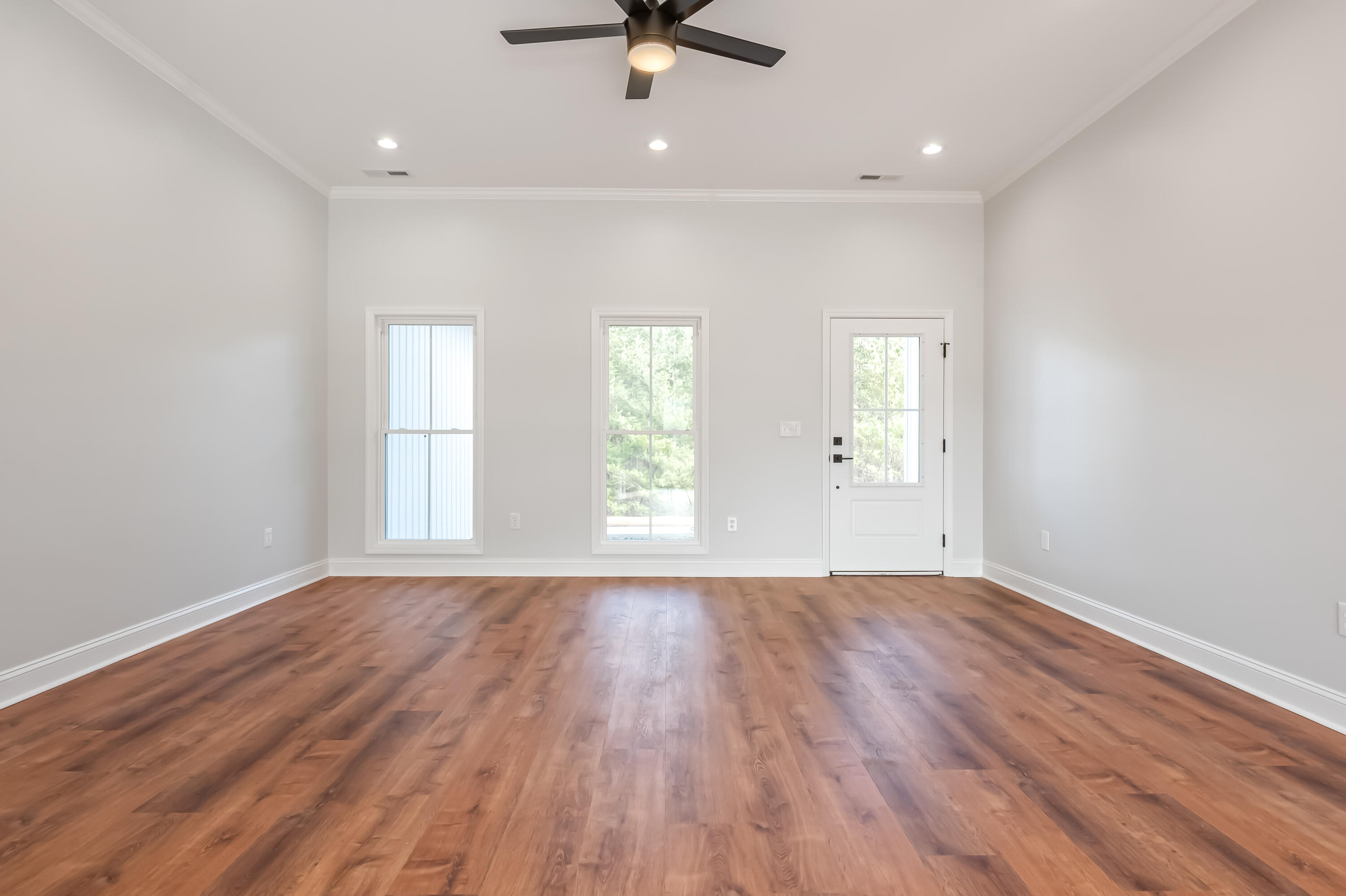 1047 Barberry Road Southeast Floyd, VA 24091 - Photo 8 of 50 an empty room with wooden floor and windows