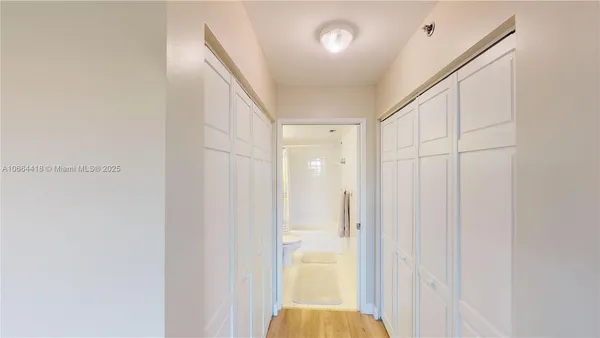 a kitchen with a stove and a microwave