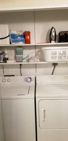 a front view of building with yard