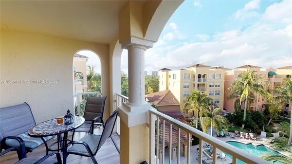 a bedroom with a bed and a large mirror