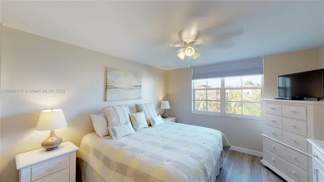 a bathroom with a tub and shower