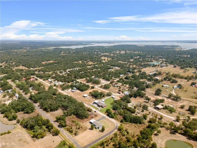 an aerial view of residential building with parking space