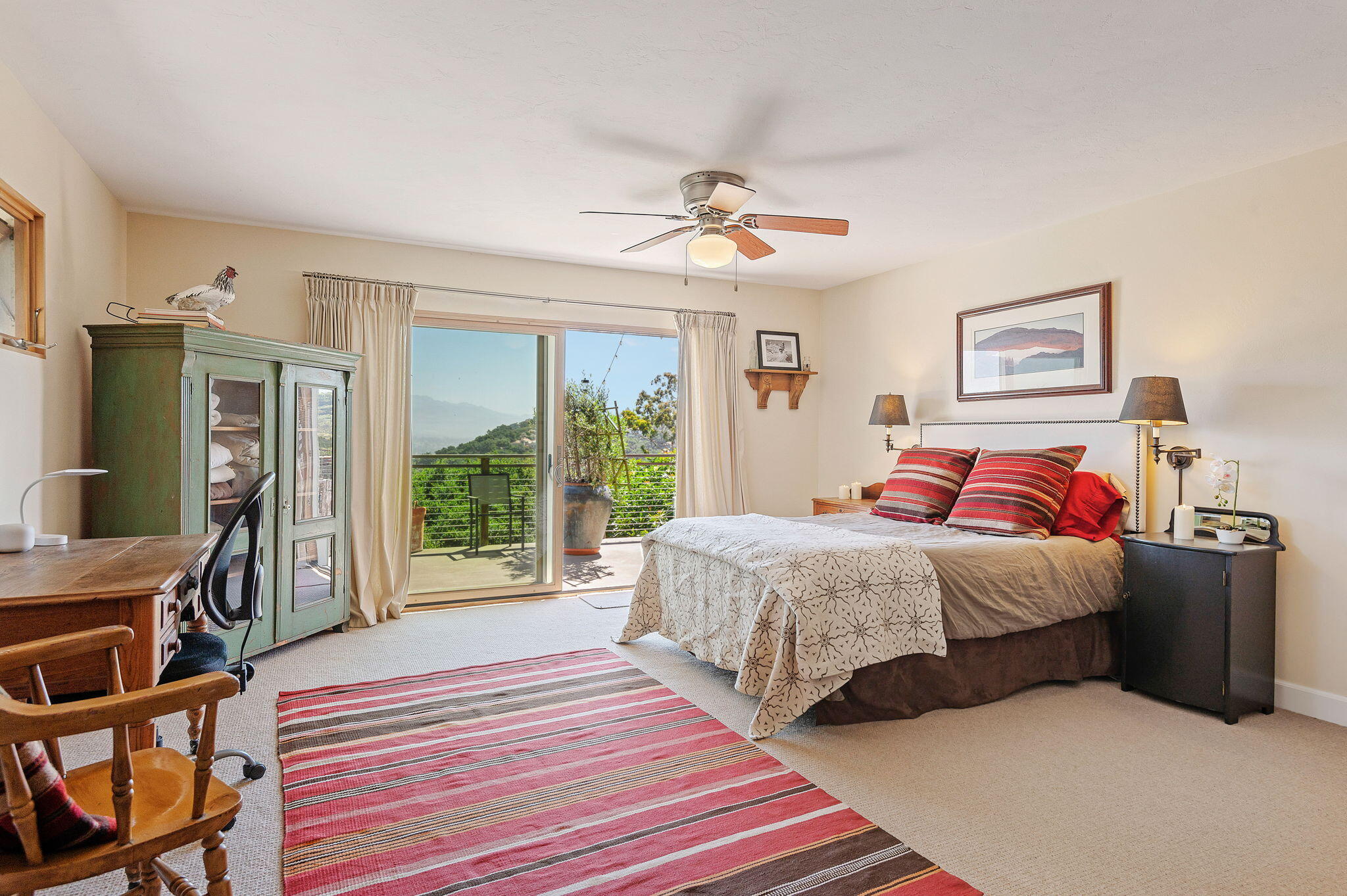 Undisclosed Address Santa Barbara, CA 93109 - Photo 20 of 30 a bedroom with a bed and a large window