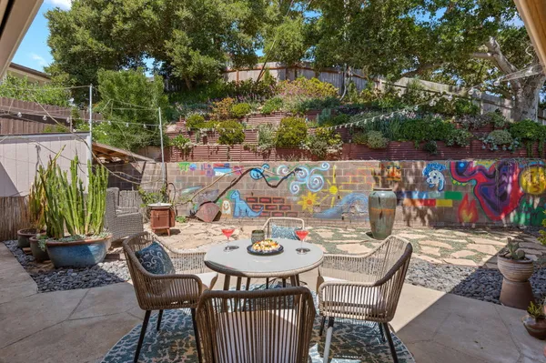 a outdoor space with patio furniture and a potted plant