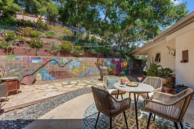 a outdoor space with patio furniture and a potted plant