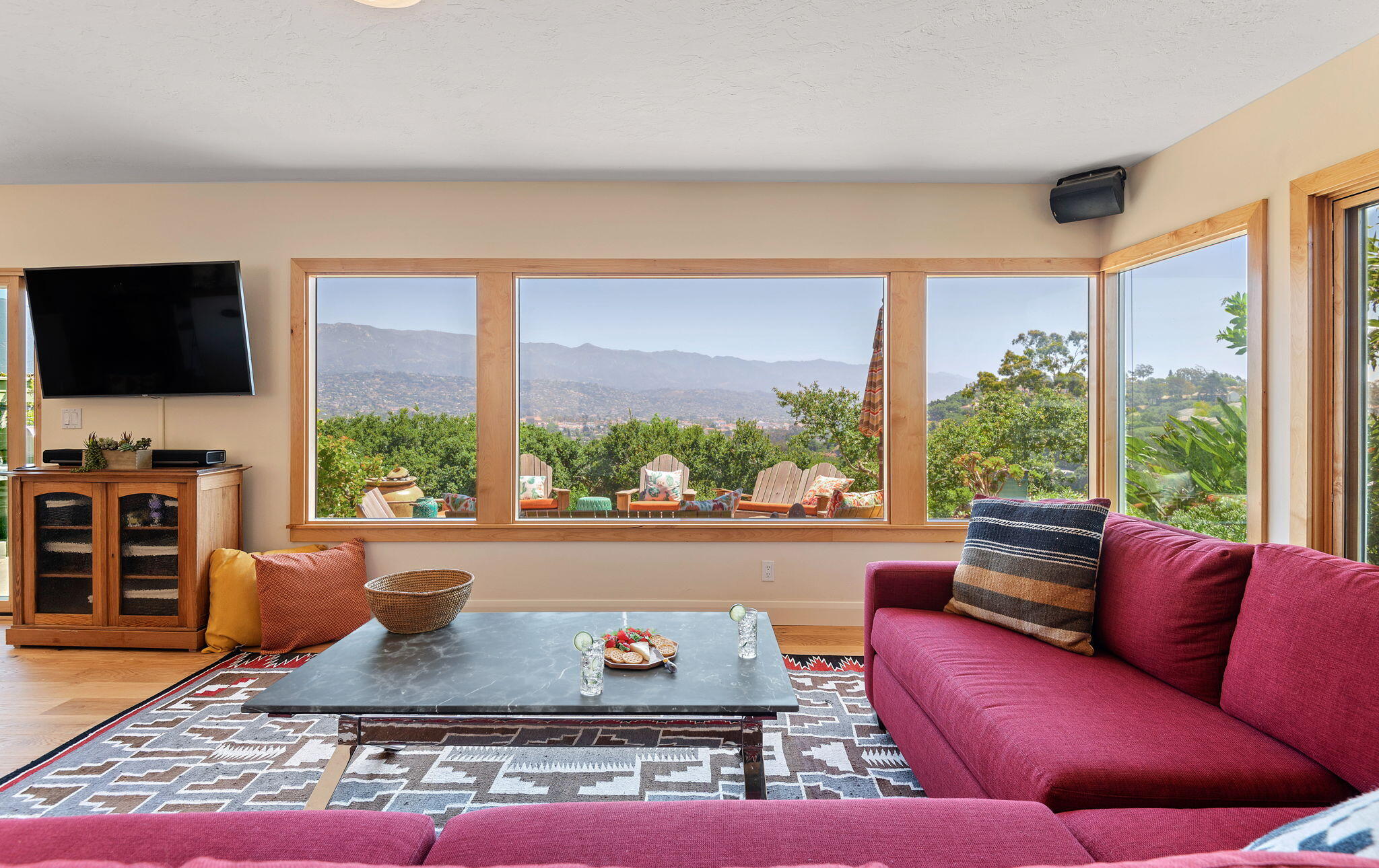 Undisclosed Address Santa Barbara, CA 93109 - Photo 4 of 30 a living room with furniture and a flat screen tv