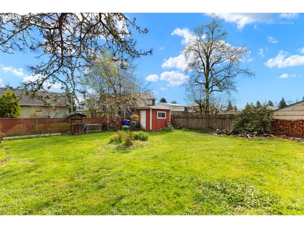 a view of a house with a big yard