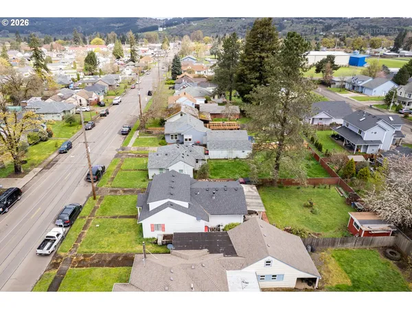 an aerial view of swimming pool and mountain