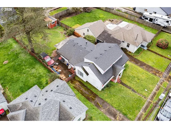 an aerial view of a house with a garden