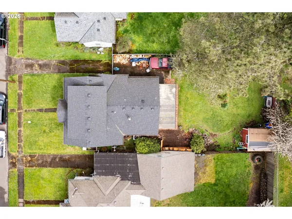 an aerial view of a house with a garden