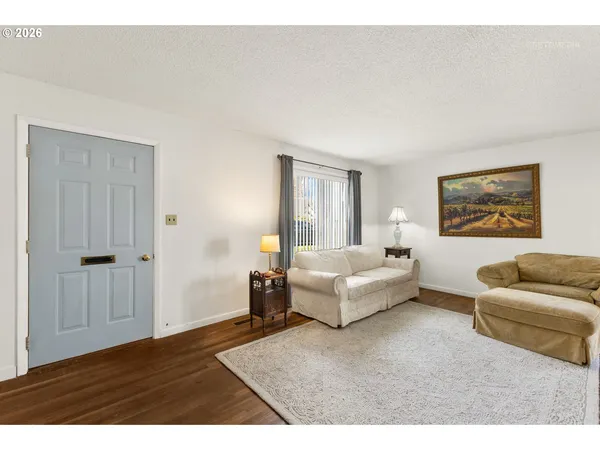 a living room with furniture and a couch