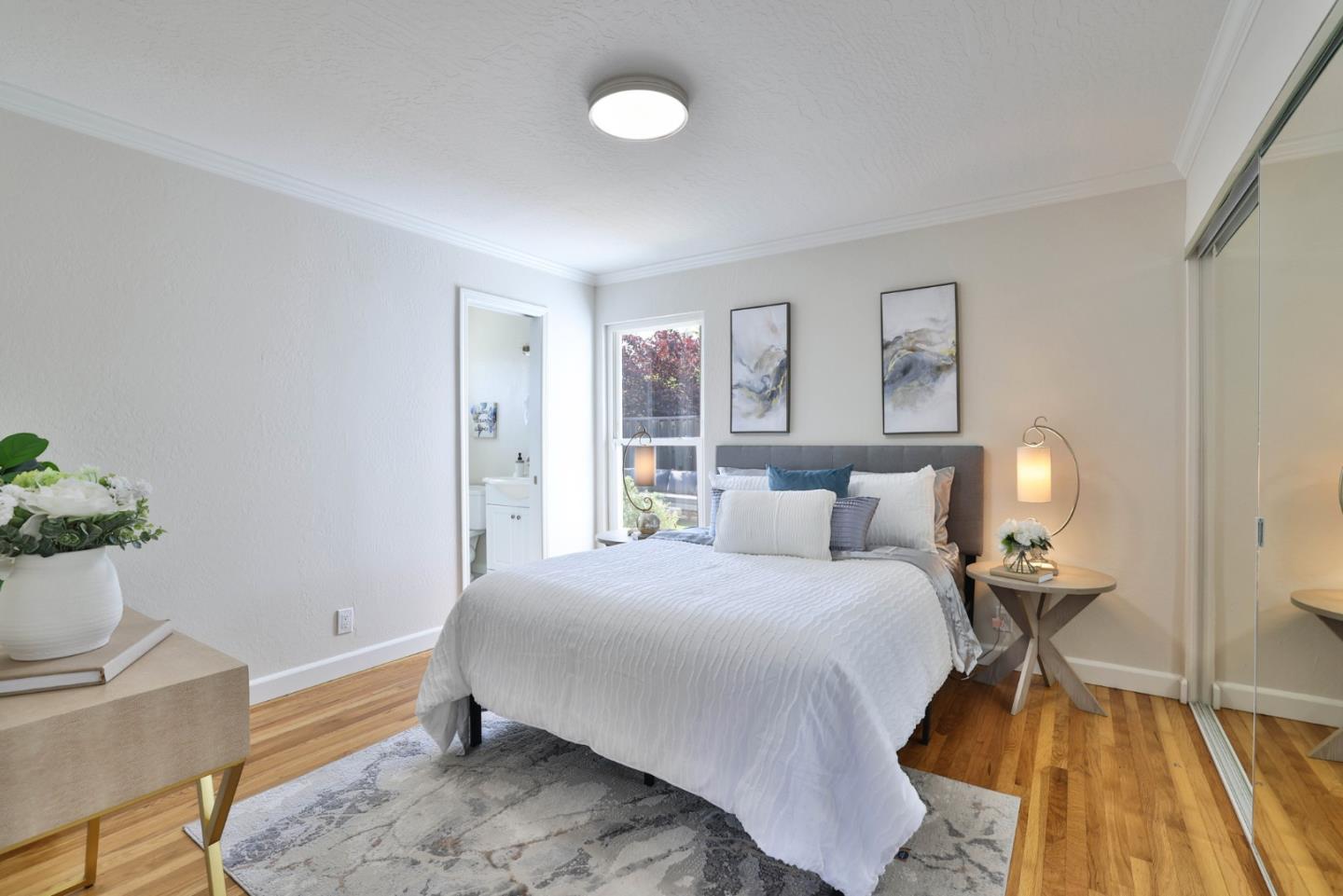 889 Ebbetts Drive Campbell, CA 95008 - Photo 17 of 33 a bedroom with a bed and window