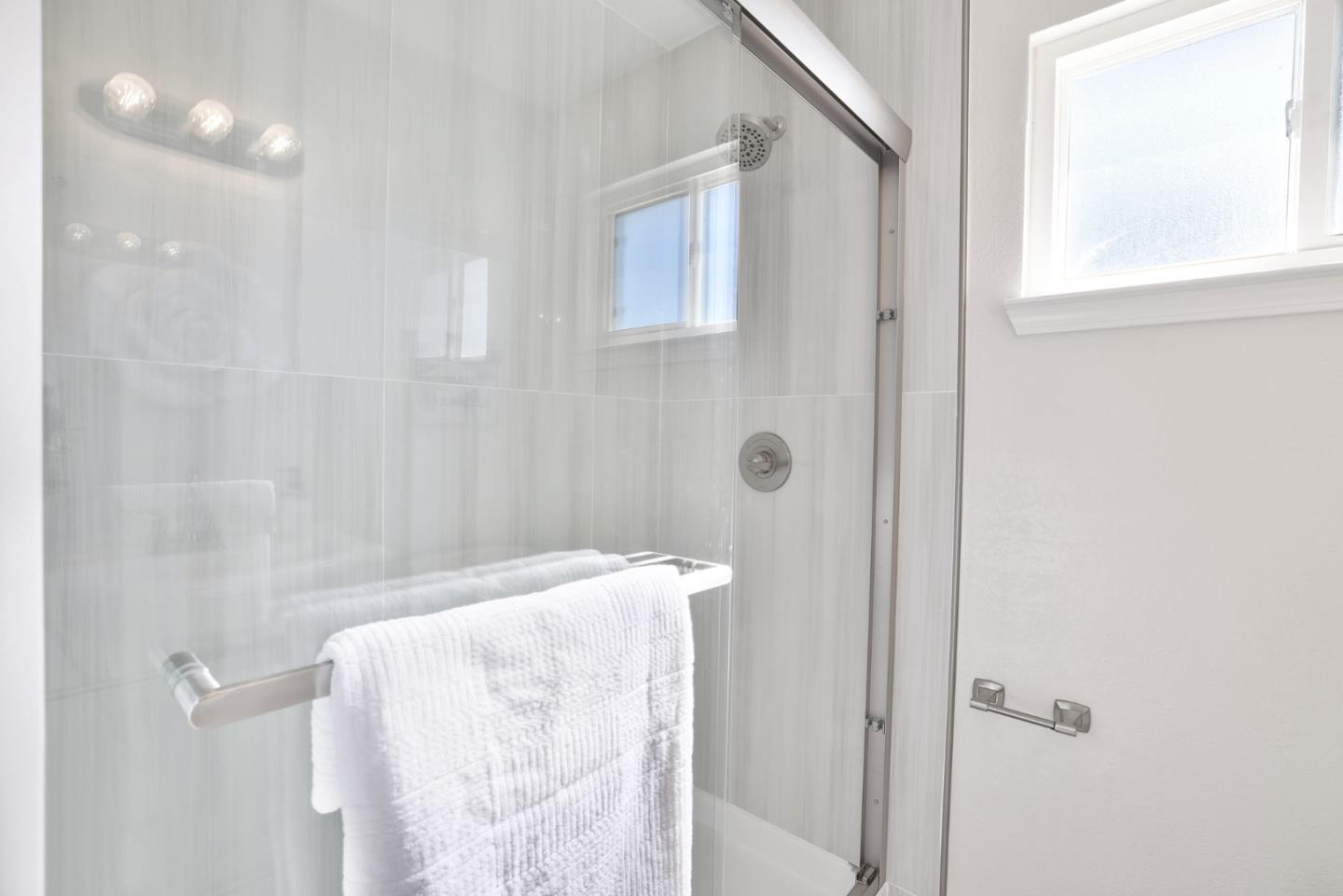 889 Ebbetts Drive Campbell, CA 95008 - Photo 20 of 33 a bathroom with a bathtub and shower