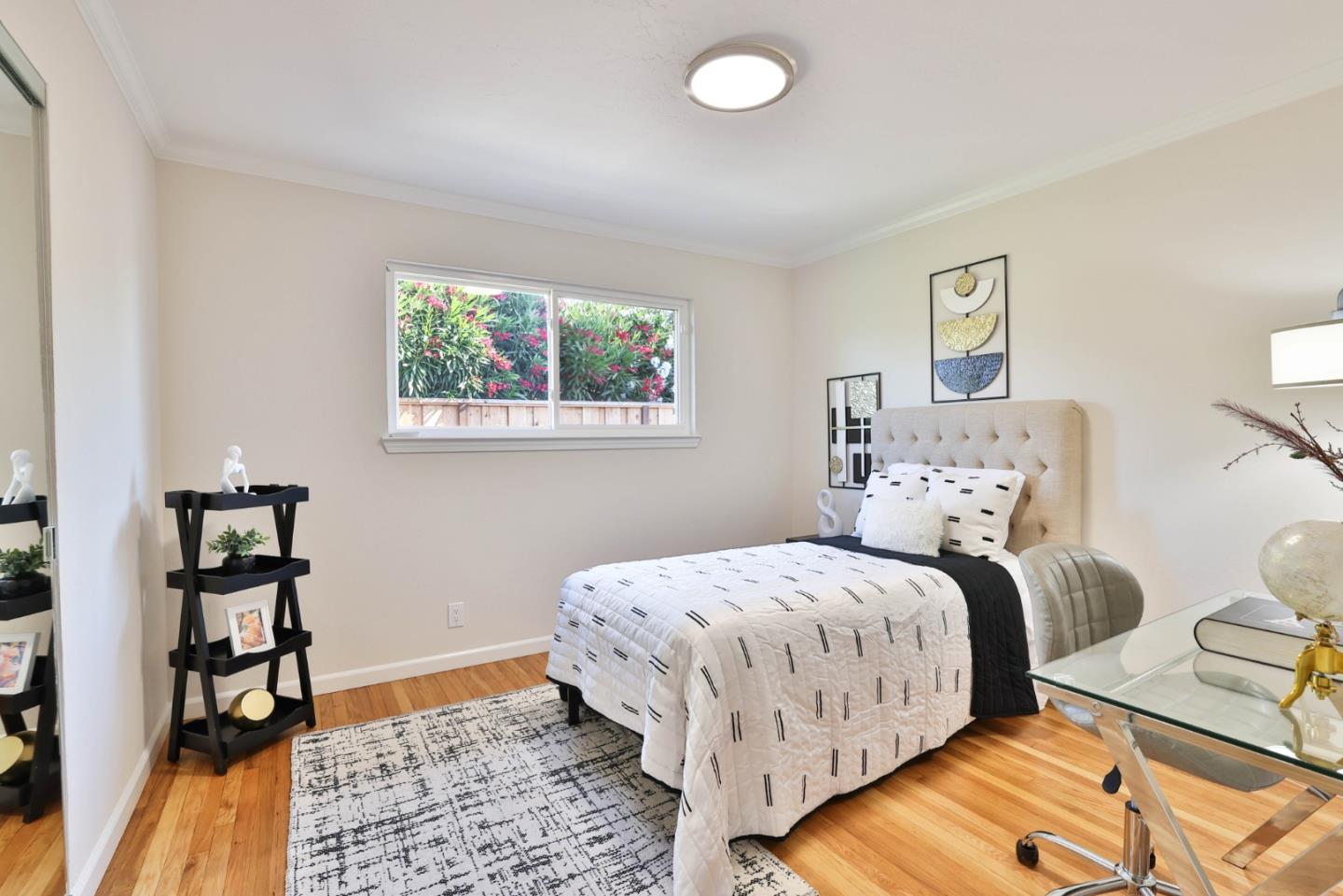 889 Ebbetts Drive Campbell, CA 95008 - Photo 21 of 33 a bedroom with bed and a window