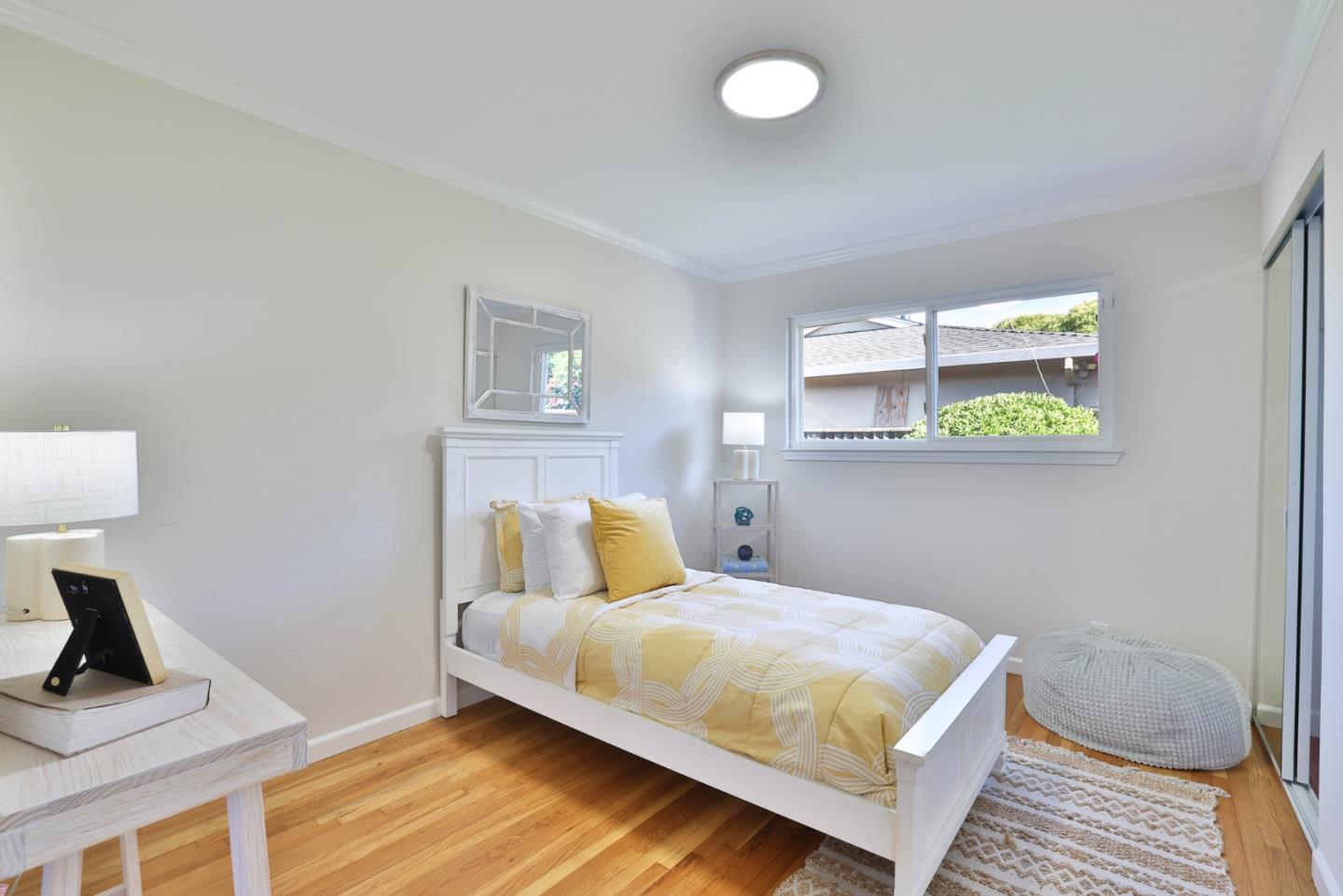 889 Ebbetts Drive Campbell, CA 95008 - Photo 23 of 33 a bedroom with a bed and a window