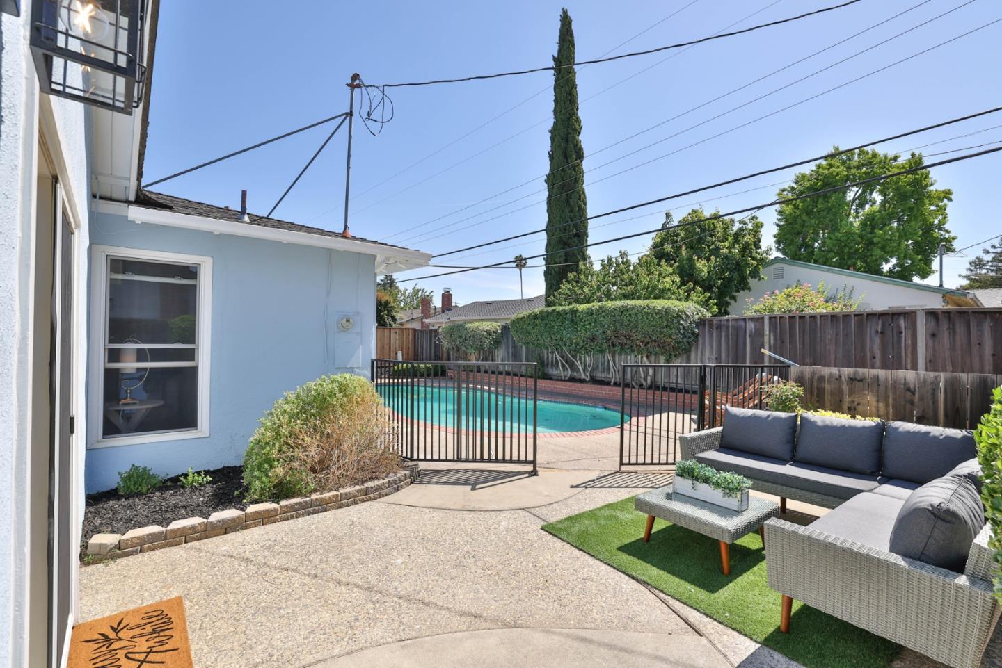 889 Ebbetts Drive Campbell, CA 95008 - Photo 24 of 33 a view of a patio with couches and potted plants