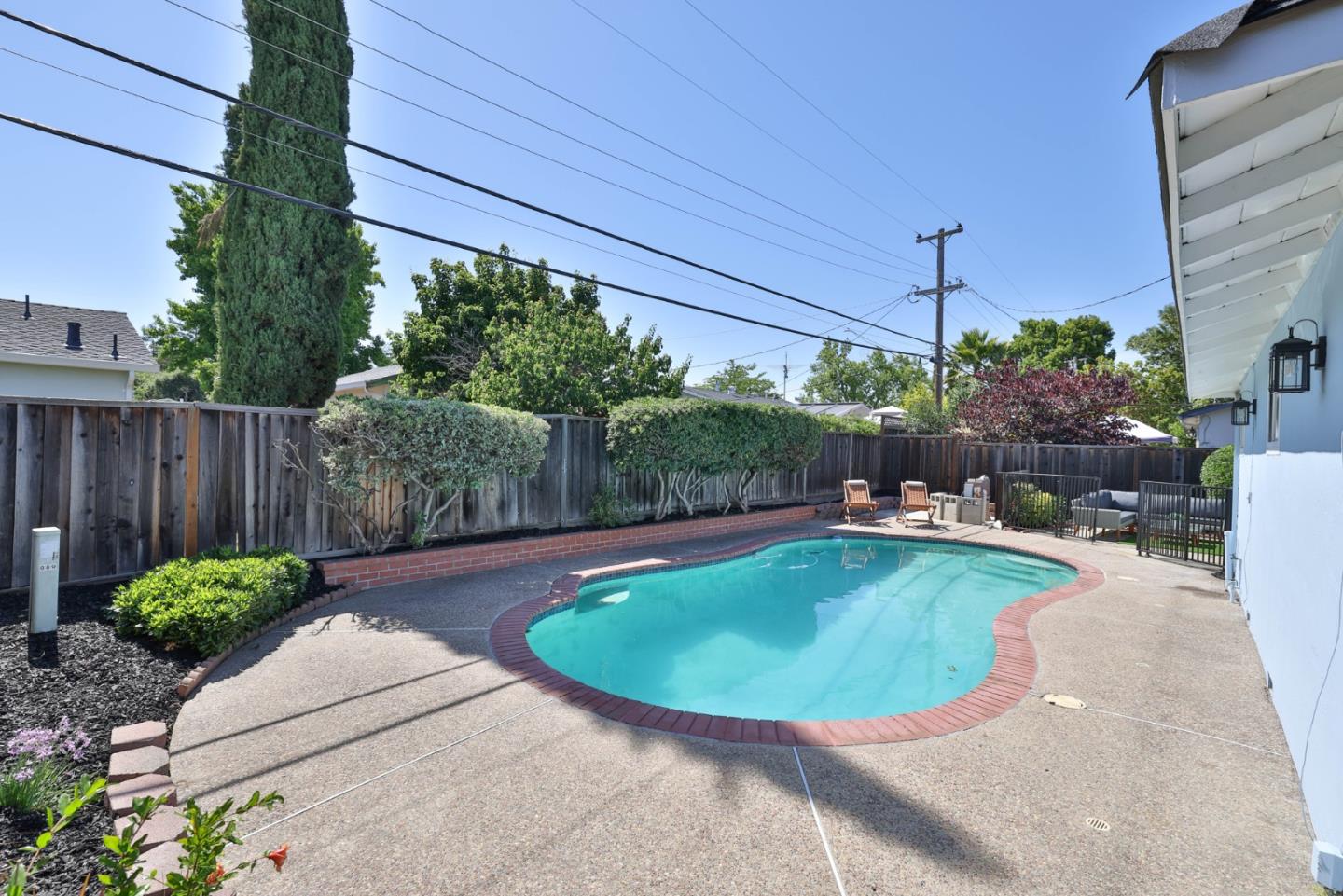 889 Ebbetts Drive Campbell, CA 95008 - Photo 26 of 33 a view of a backyard with swimming pool