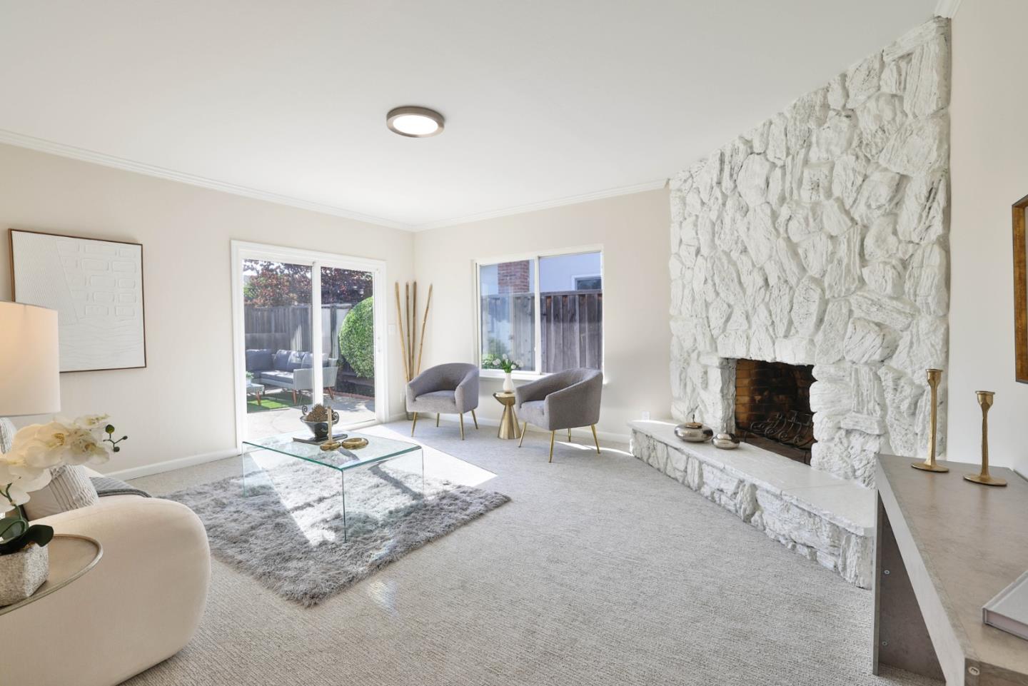 889 Ebbetts Drive Campbell, CA 95008 - Photo 4 of 33 a living room with furniture and a flat screen tv