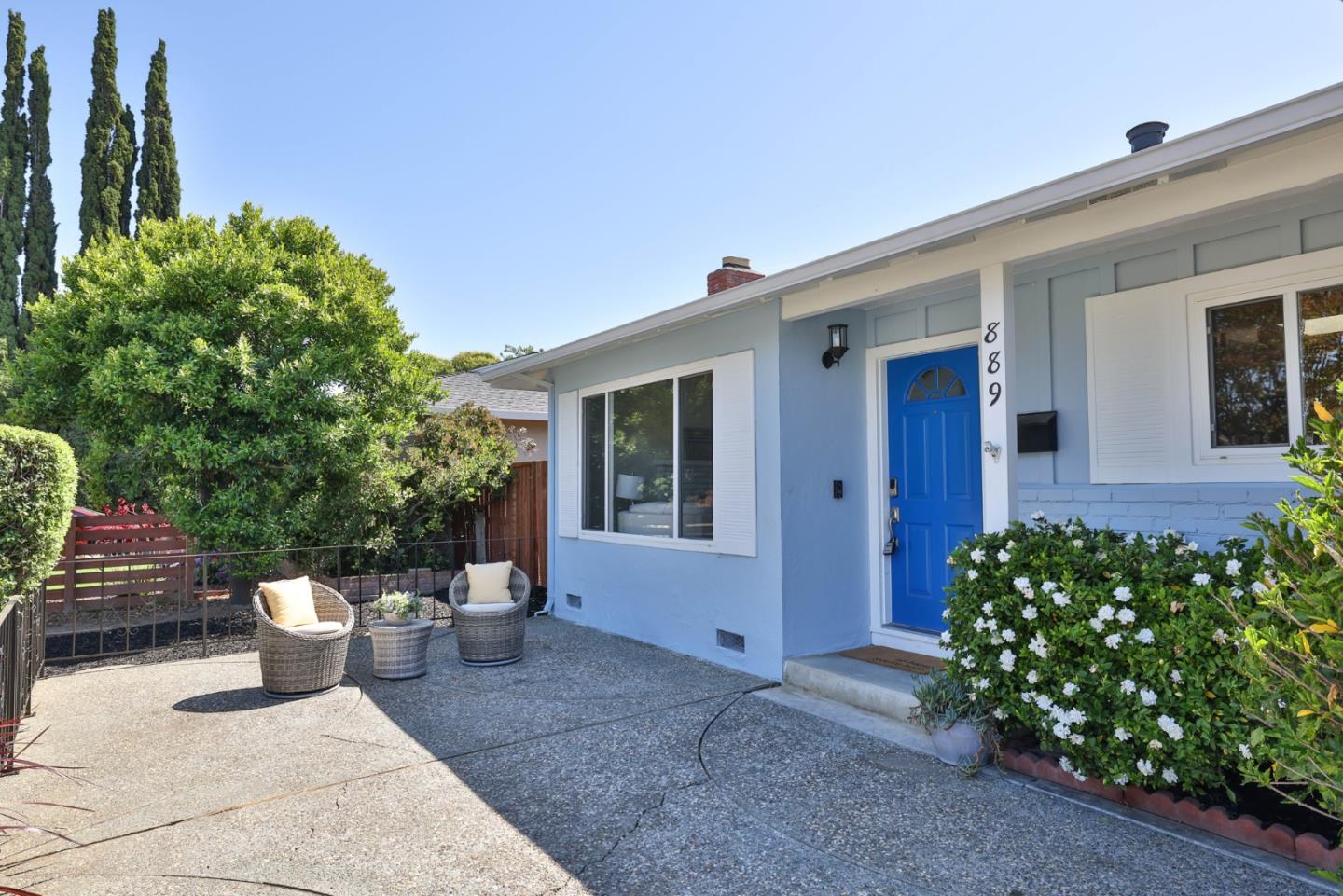 889 Ebbetts Drive Campbell, CA 95008 - Photo 6 of 33 a view of a house with a backyard and a garden
