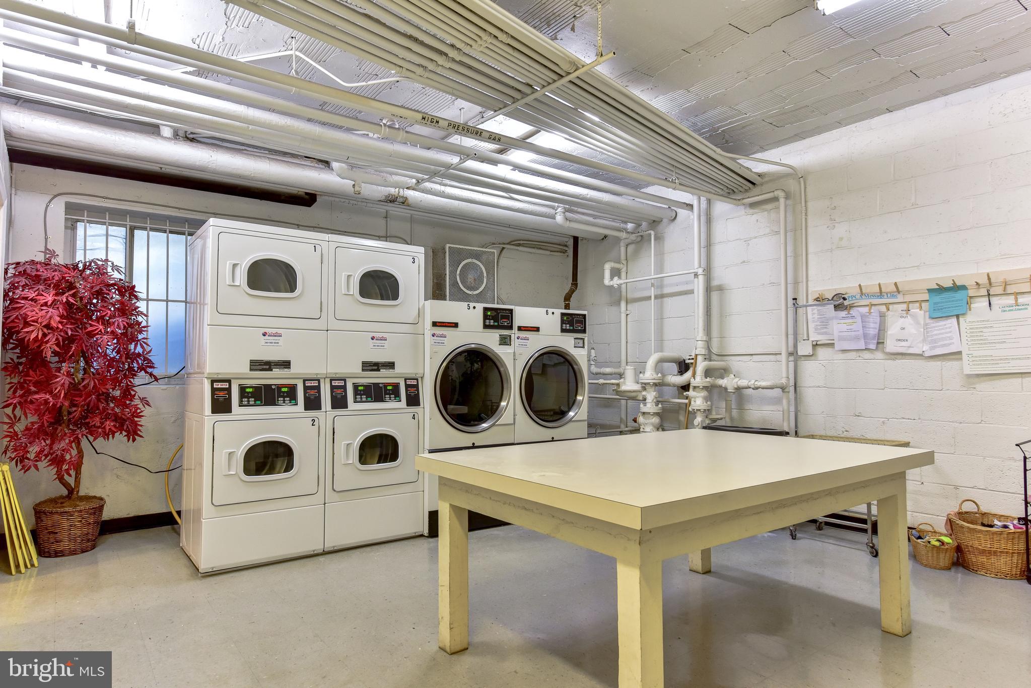 4100 W Street Northwest, Unit 510 Washington, DC 20007 - Photo 20 of 22 a view of a room with washer and dryer