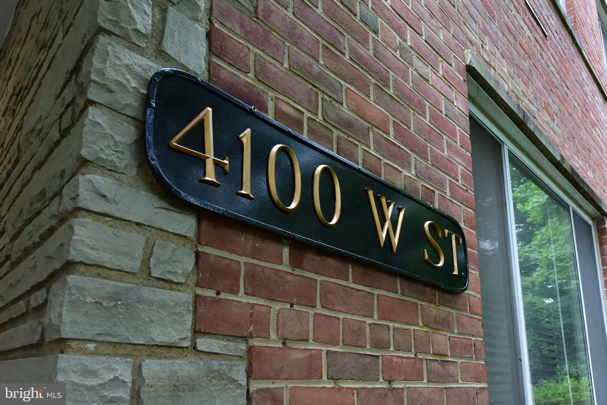4100 W Street Northwest, Unit 510 Washington, DC 20007 - Photo 21 of 22 a street sign on a pole