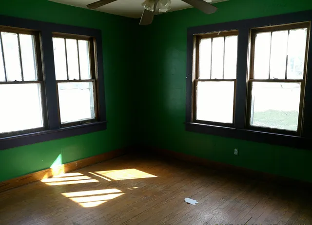 a view of a room that has a window in it