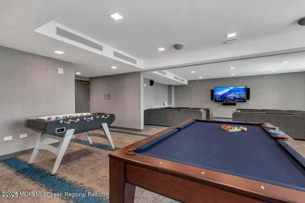 a view of a room with table tennis table