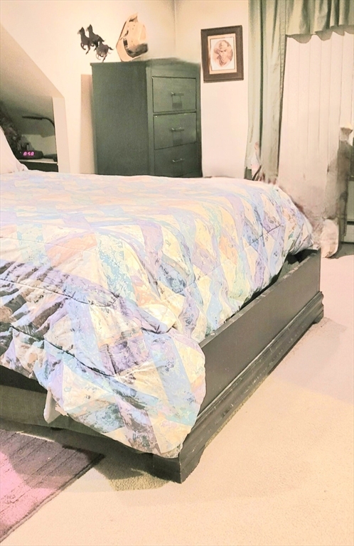 4 Narrows Road Assonet, MA 02702 - Photo 15 of 15 a bedroom with a bed and a flat screen tv