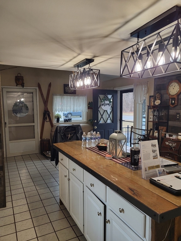 4 Narrows Road Assonet, MA 02702 - Photo 7 of 15 a large kitchen with a sink and cabinets