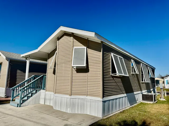 a view of livingroom with furniture and floor to ceiling window