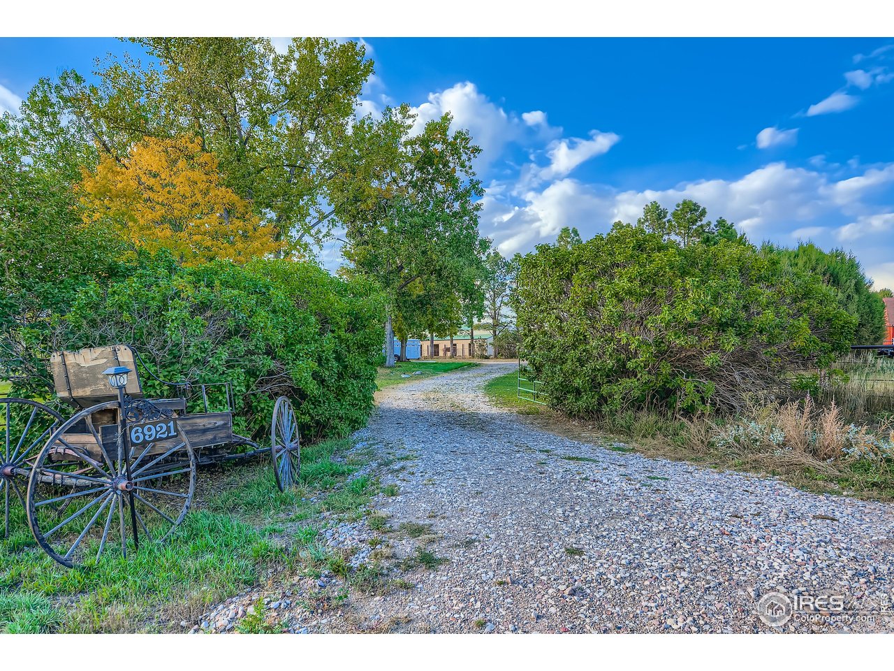 6921 Ridge Valley Court Loveland, CO 80538 - Photo 2 of 50 a view of a backyard with chairs