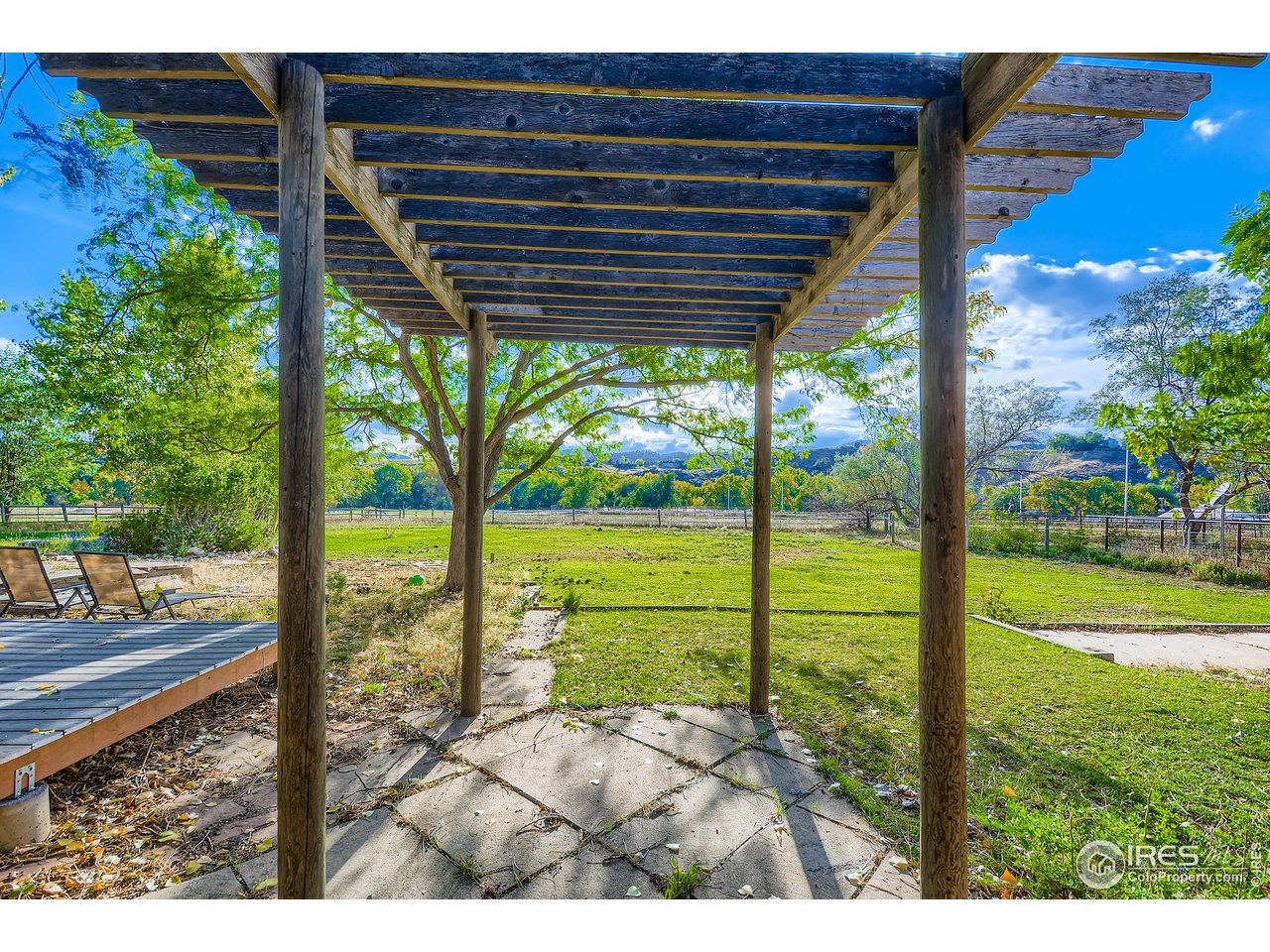 6921 Ridge Valley Court Loveland, CO 80538 - Photo 40 of 50 a view of a porch and garden
