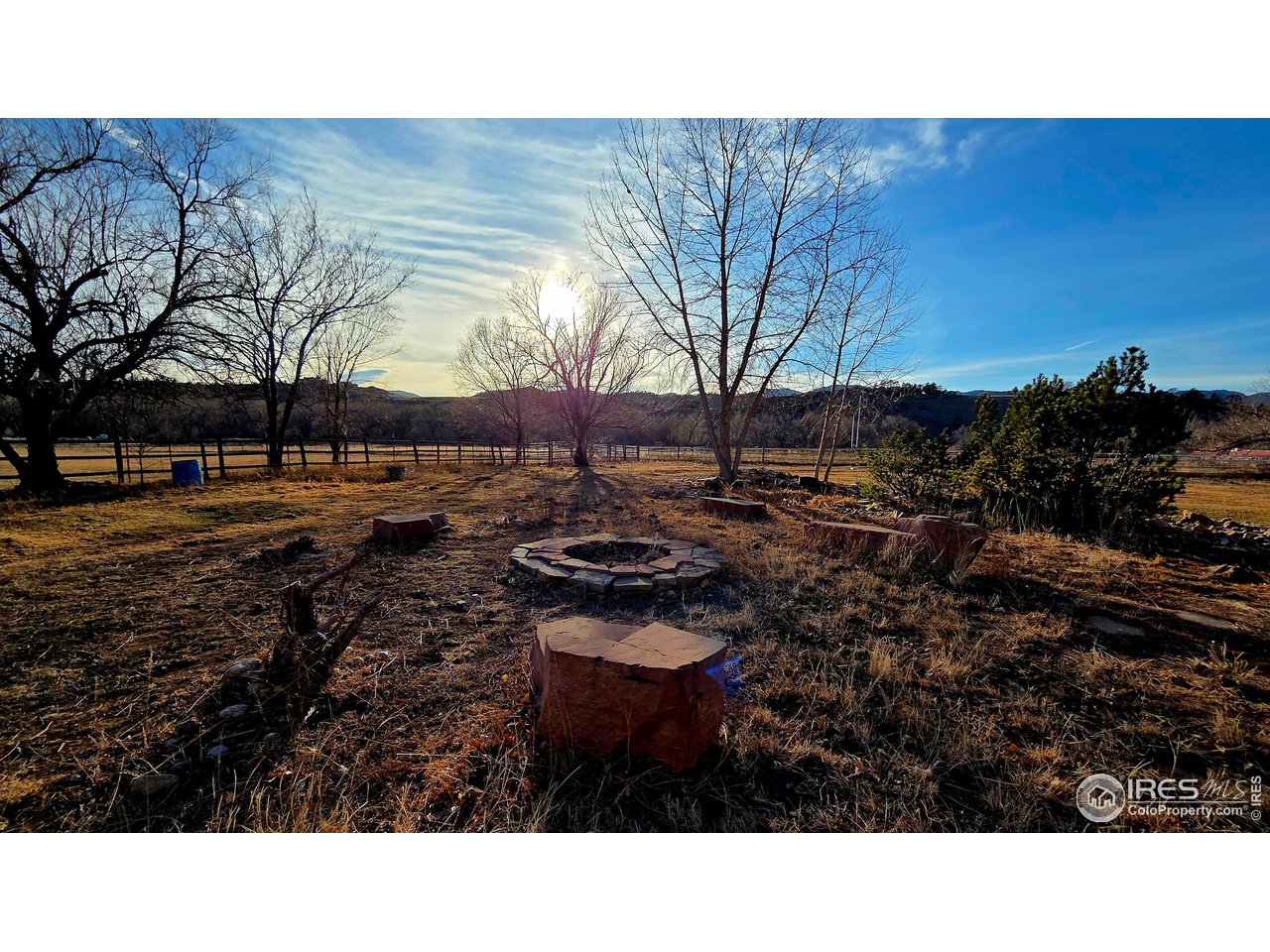 6921 Ridge Valley Court Loveland, CO 80538 - Photo 50 of 50 a backyard of a house with lots of green space