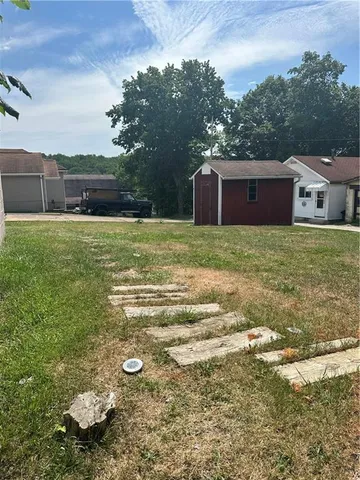 a house view with a garden space